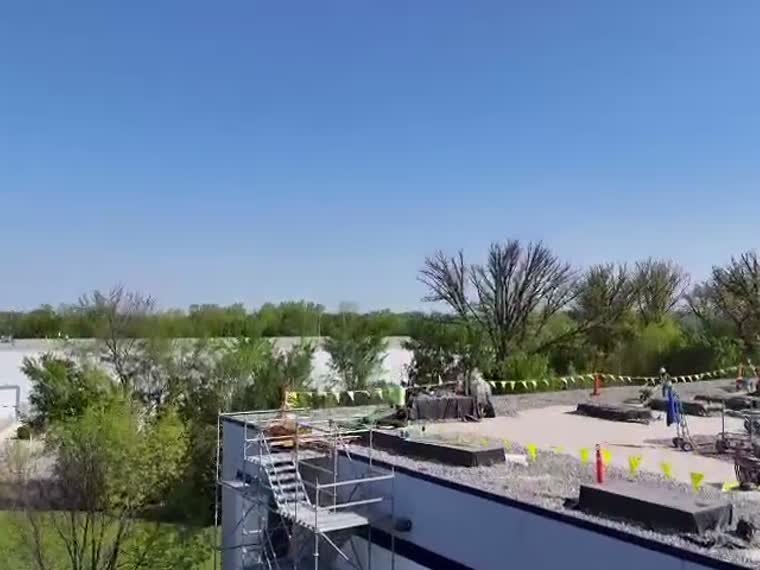 View from the roof edge out across the field.