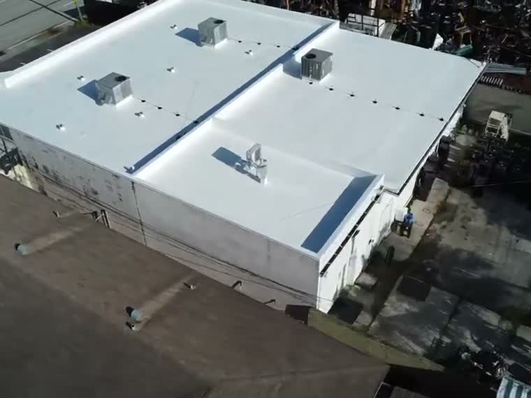 Commercial roof with mechanical screening in place.